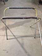 (2) portable work stands, metal top, creeper mat