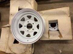 (4) 15” wheel rims in boxes
