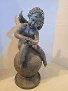 VINTAGE CHERUB ON BALL RESIN FIGURINE 23" TALL