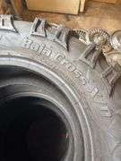 (4) tires like new - 26/10.00/14 - see photos