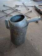 (2) metal oil cans/pitchers