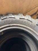 (4) tires like new - 26/10.00/14 - see photos