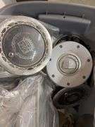 Tote of hub caps and parts -Ford, Oldsmobile and more