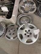 Large tote of hub caps and parts -Pontiac, Chrysler and more