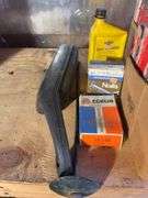 (2) shelves of vehicle-related items - sparkplugs, signs, and more