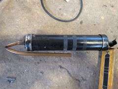 Work light on extension reel and suction gun