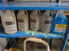 Shelf of coolant, cleaners, windshield washer solvent, and more