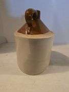 BROWN TOP 1 GALLON CROCK JUG HAS HAIRLINE ON BOTTOM