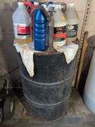 55 gallon metal drum with some antifreeze