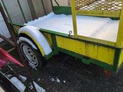 Open green and yellow trailer - 8' x 5' bed - 2" ball hitch - flat tire