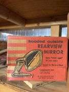 Shelf of miscellaneous car parts and other items