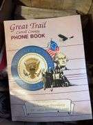 (2) shelves of vehicle-related items - sparkplugs, signs, and more