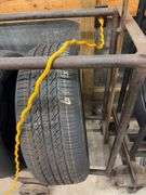 Metal tire rack on wheels - 74" long, 18" deep, 72" tall
