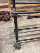 Metal tire rack on wheels - 75" x 14" x 72"