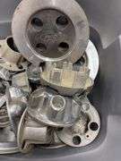 Tote of Ford hub caps and parts