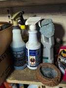 Shelf of glass cleaner, other cleaners, and other vehicle fluids