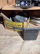 Contents of cabinet - oil filters, wiper blades, CB radios, manuals, and more