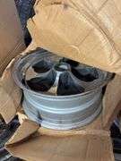 (2) wheel rims in boxes - see photos