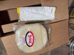 Contents of cabinet - oil filters, wiper blades, CB radios, manuals, and more