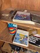 Contents of cabinet - oil filters, wiper blades, CB radios, manuals, and more