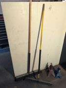 (2) shop brooms and (2) jack stands