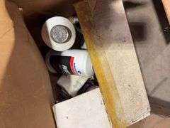 Large assortment of car parts, office supplies, and miscellaneous