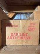 Shelf of miscellaneous car parts and other items