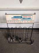 NAPA metal rack with hose clamps