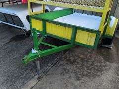 Open green and yellow trailer - 8' x 5' bed - 2" ball hitch - flat tire