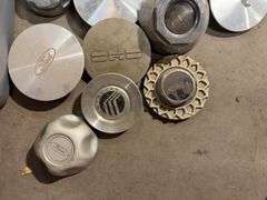 Tote of hubcaps/center caps - mostly Ford