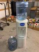 Crystal Springs water cooler with (2) jugs