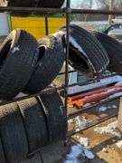 Metal tire rack - 21' x 18" x 7' - stored outside, contents not included