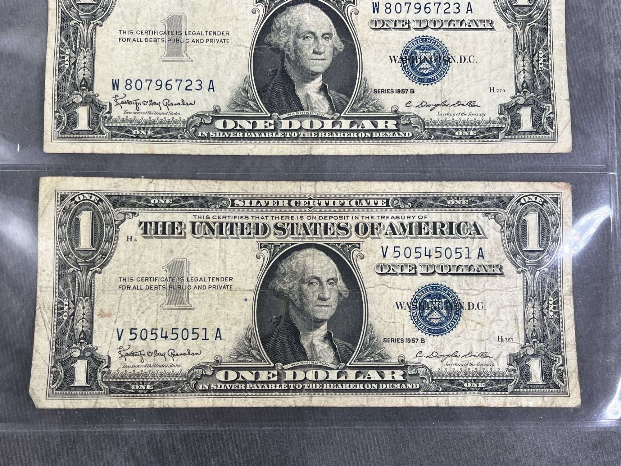 Four $1.00 Blue Seal Silver Certificates