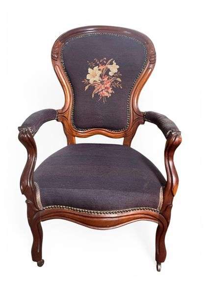 Antique slipper chair with needlepoint design