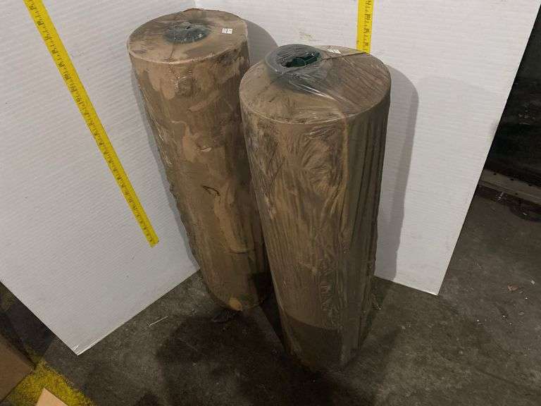 Two rolls of brown packing paper