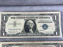 Four $1.00 Blue Seal Silver Certificates