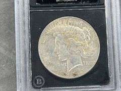 1934-D Authenticated VG Peace Silver Dollar