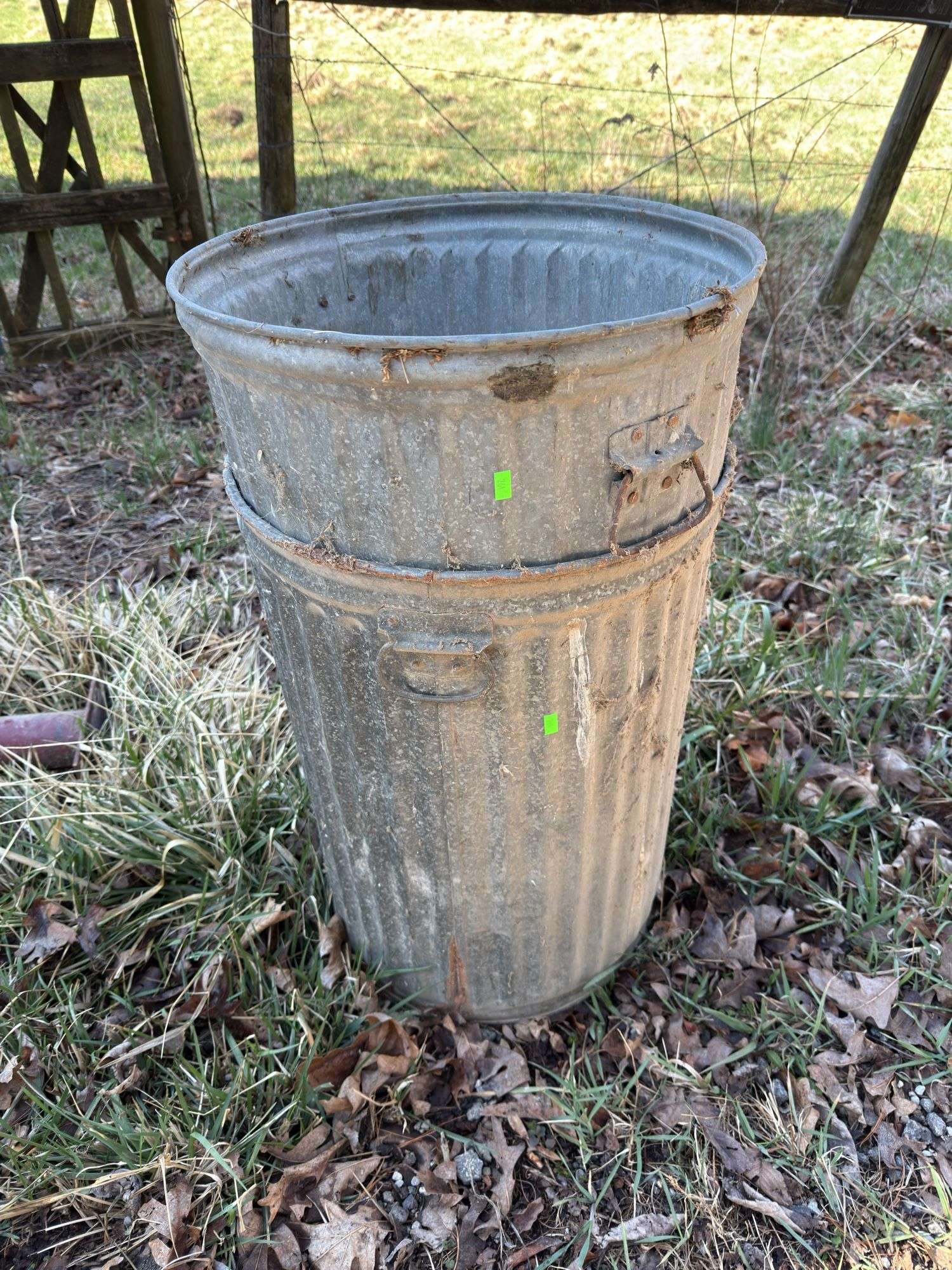 Two Galvanized Trash Bins