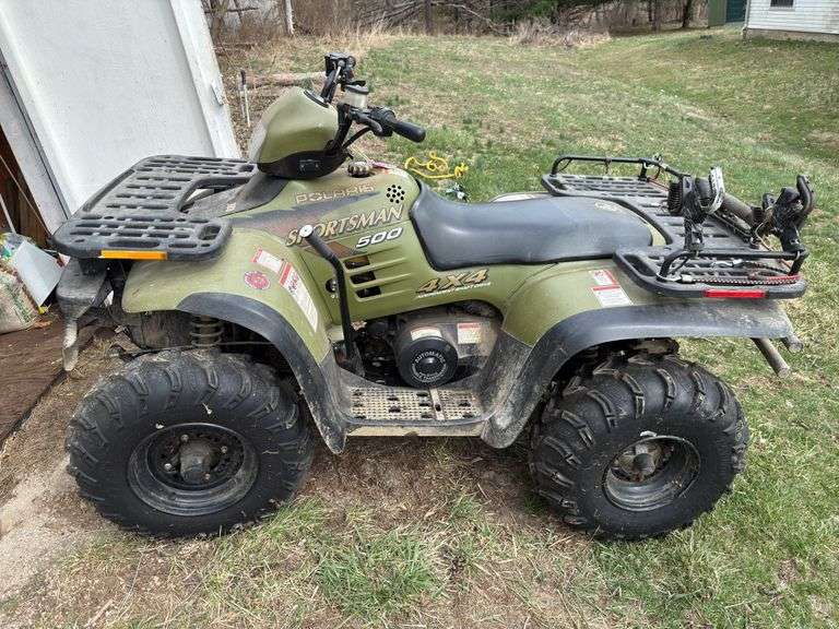 1997 Polaris Sportsman 500 1599 miles. Starts and runs, needs new battery w/ 4 ft Polaris snow blade