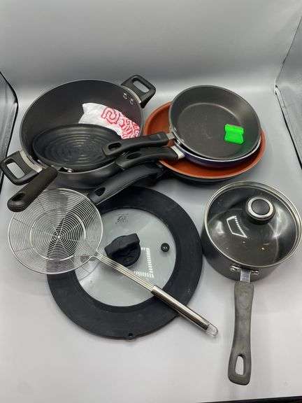 ASSORTED POTS AND PANS - Kaufman Realty & Auctions