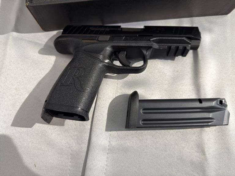 Remington 9 mm Luger handgun  w/ two Clips