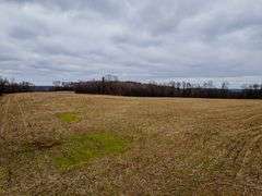 27.9 +/- Acres Farm land and woods. Great Building sites