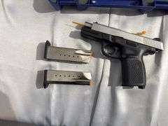 Smith & Wesson .40 cal Handgun with case and extra Clip