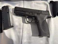 Smith & Wesson 40 cal Handgun HAF1806 with case and extra clip