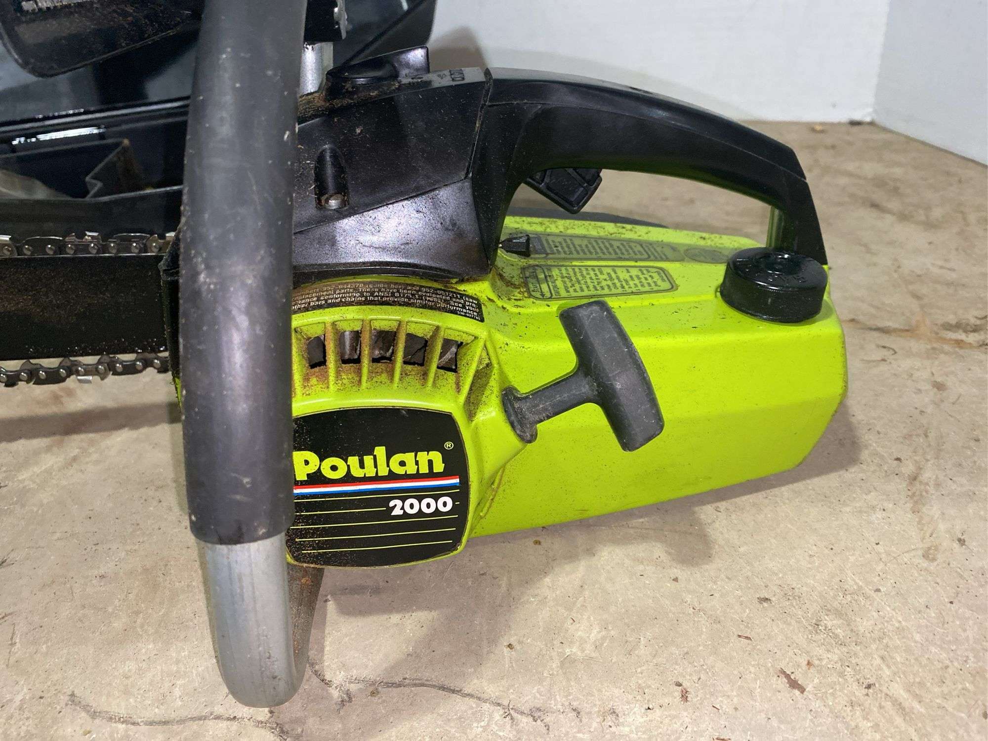 Paolan Poulan 2000 Chainsaw and Case - Kaufman Realty & Auctions