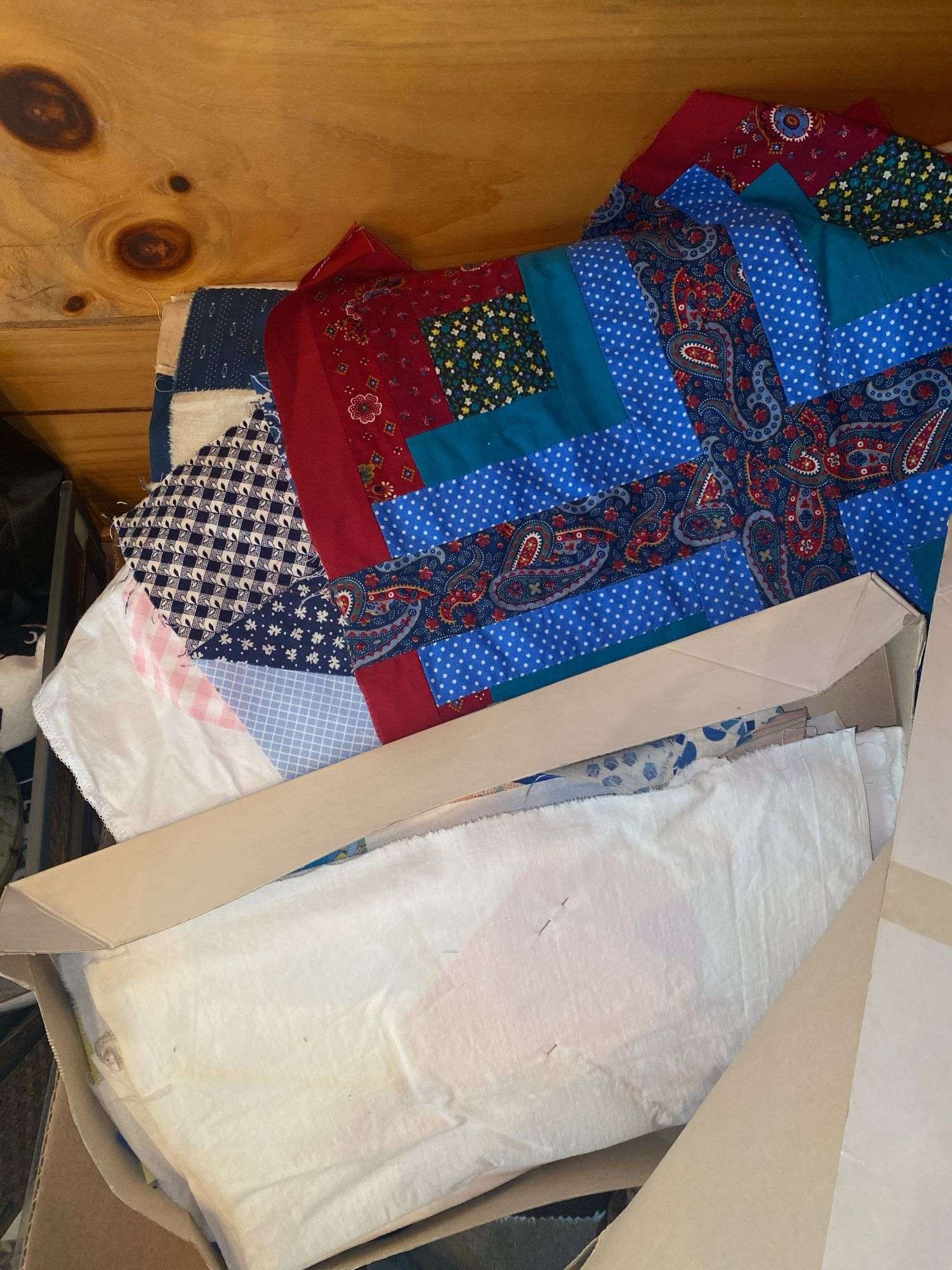 Assortment of Linens, Fabrics, and Hangers