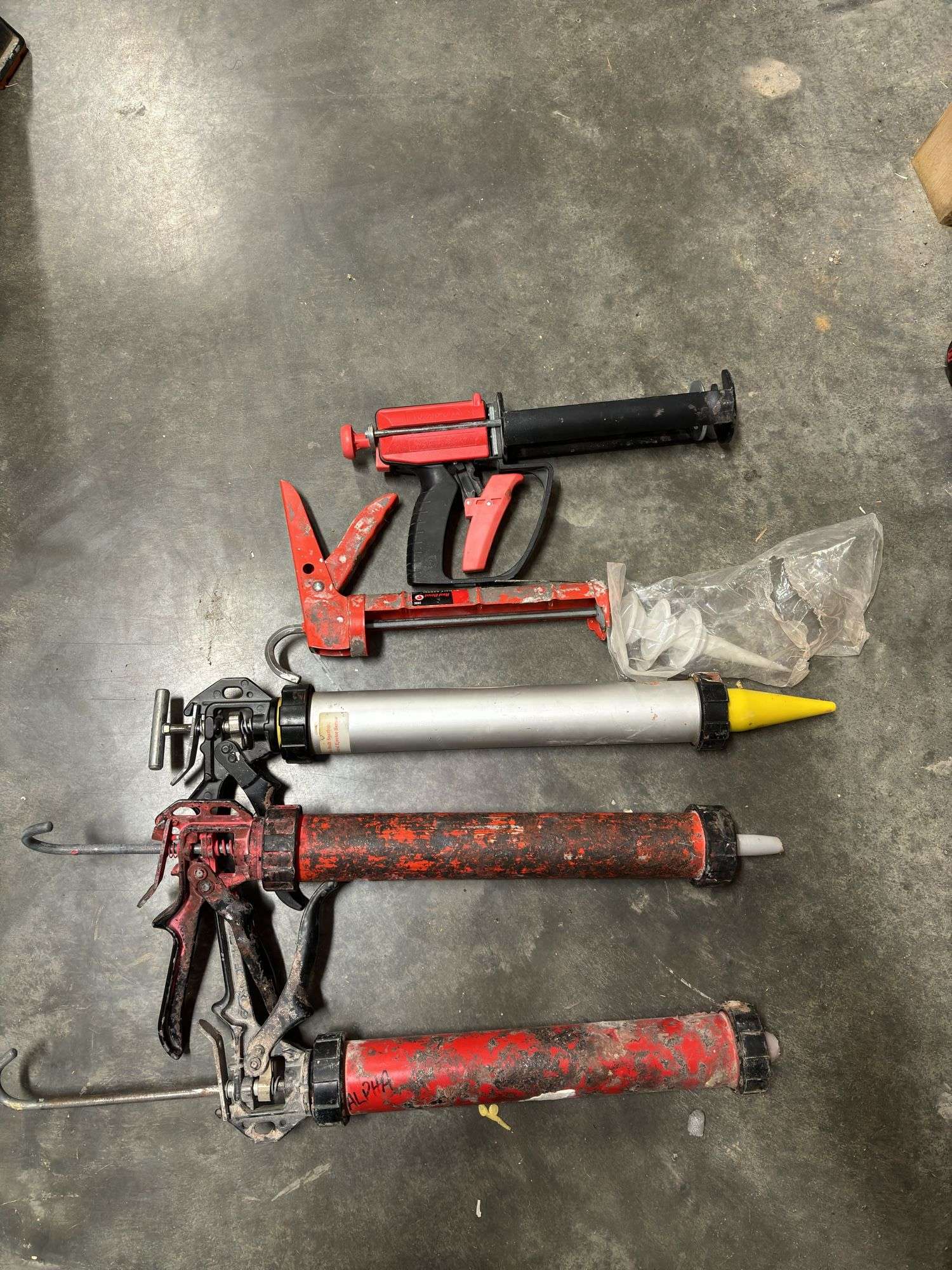Caulk guns