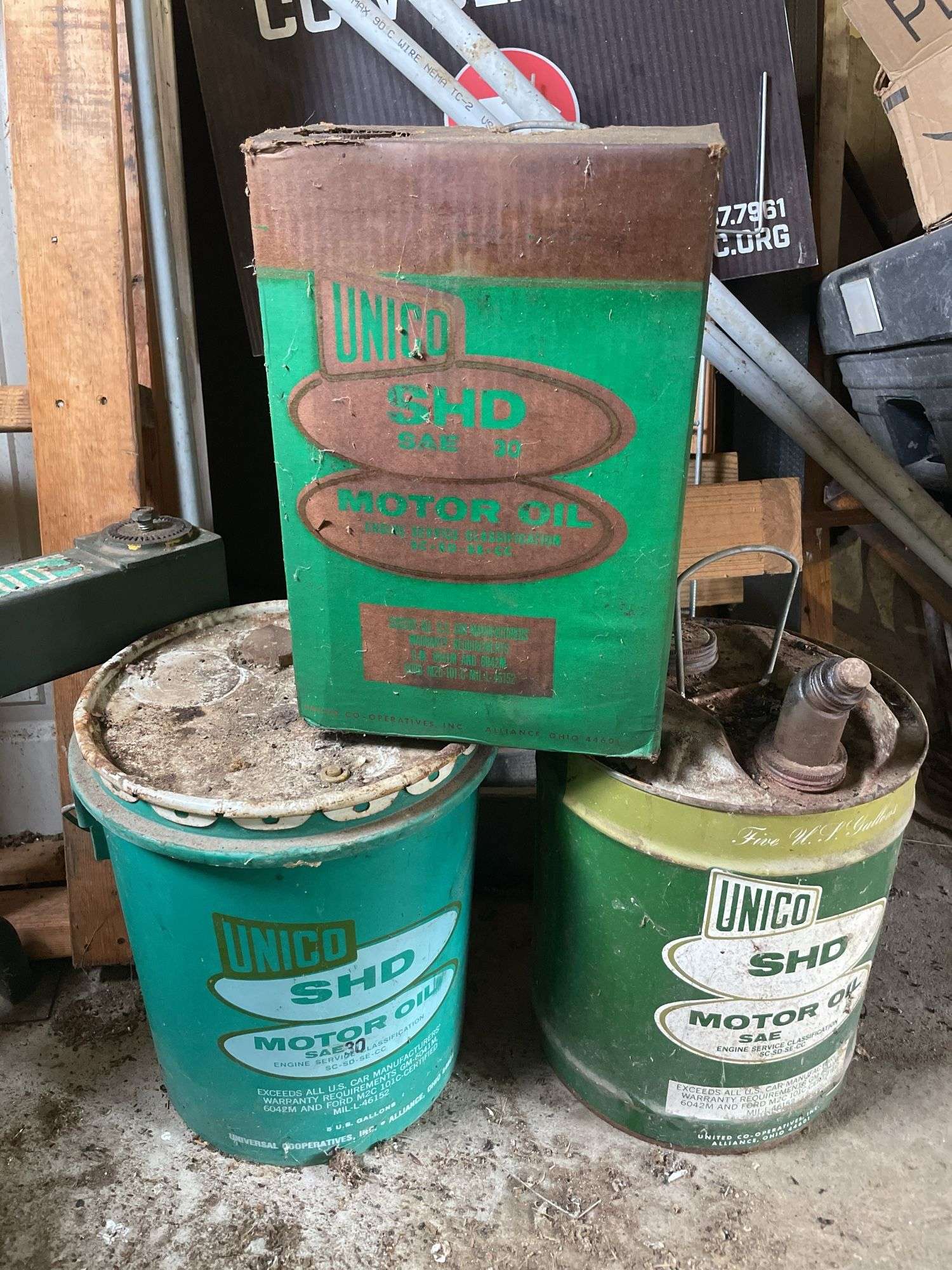 (3) antique oil cans
