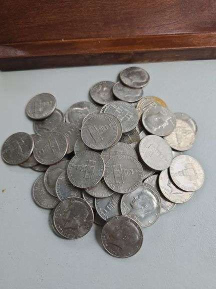 LOT OF 65 KENNEDY HALVES
