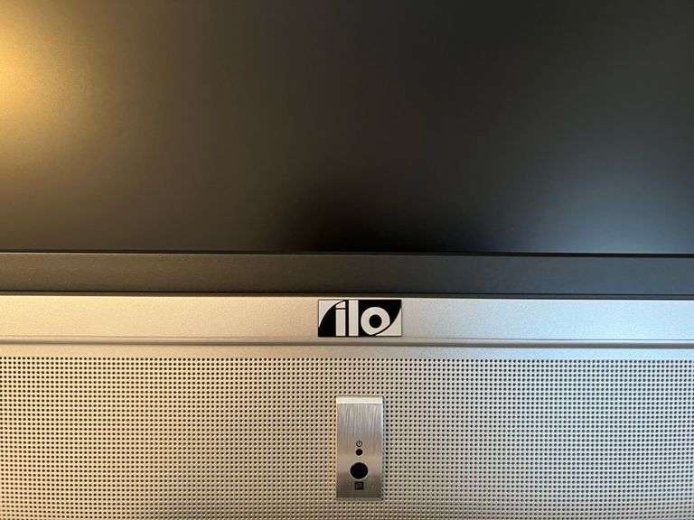ilo Flatscreen Television with Remote - Kaufman Realty & Auctions